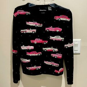 Mary Kay type. Pink Cadillac sweater. Black with pink white and black pearls.